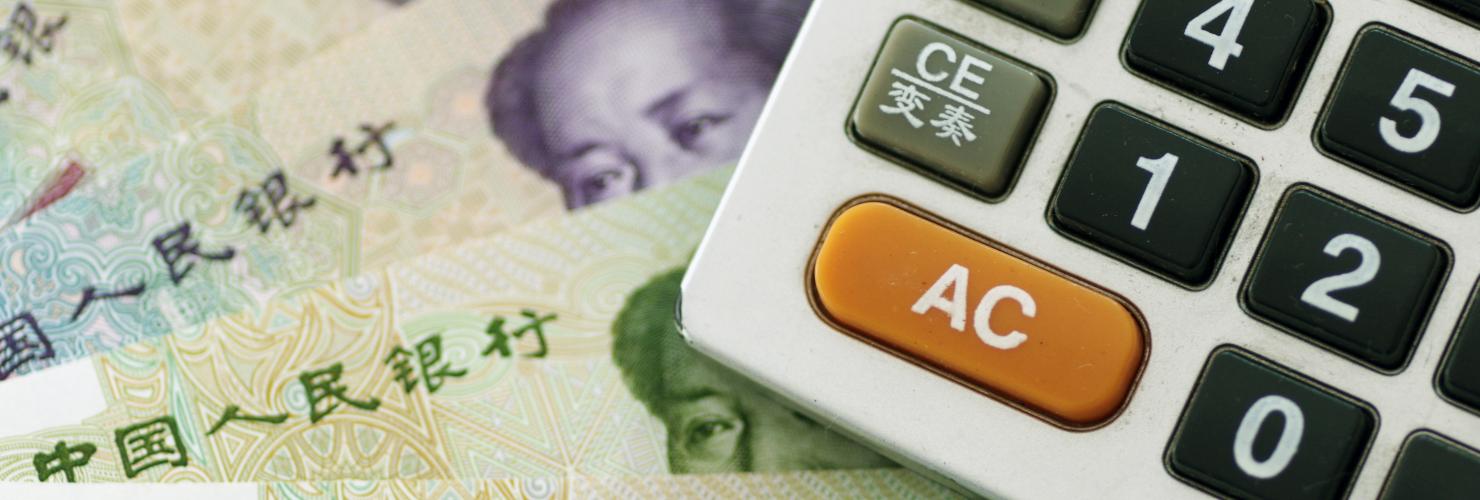 Chinese banknotes and calculator