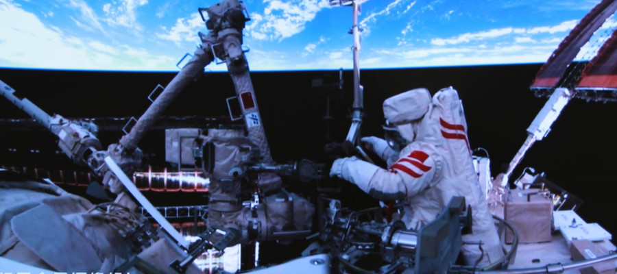 Beijing Aerospace Control Center shows Shenzhou-20 astronaut Chen Zhongrui performing extravehicular activities outside China's orbiting space station on June 26, 2025.