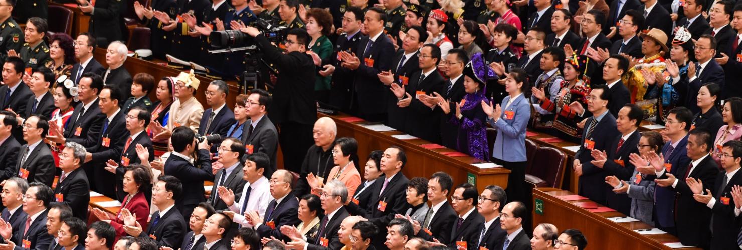 Deputies attend the closing meeting of the National People's Congress in Beijing on March 15, 2019. 