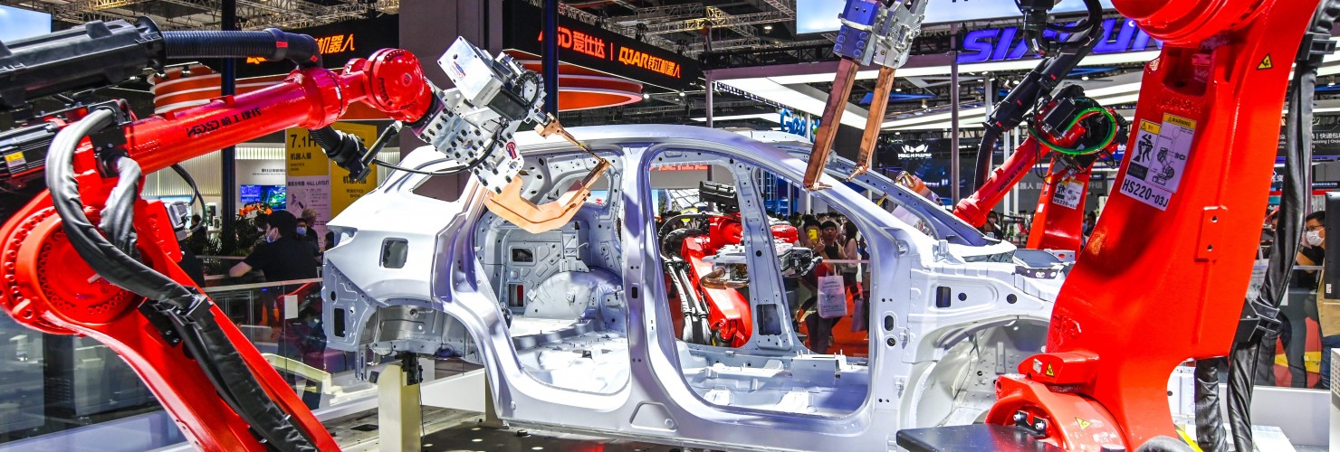 welding robot operates on a vehicle at the stand of Jiangsu Hagong Intelligent Robot Co., Ltd. (HGZN), a high-tech listed company with high-end intelligent manufacturing and industrial robots, during 2020 China International Industry Fair