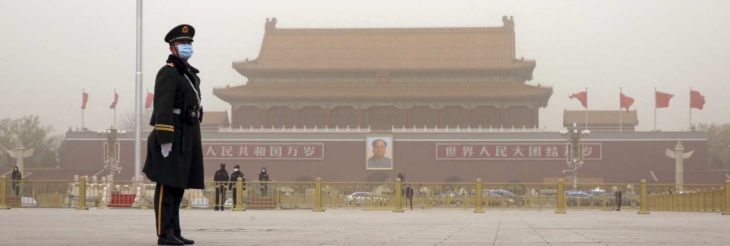Police officers are seen at Tiananmen Square in Beijing