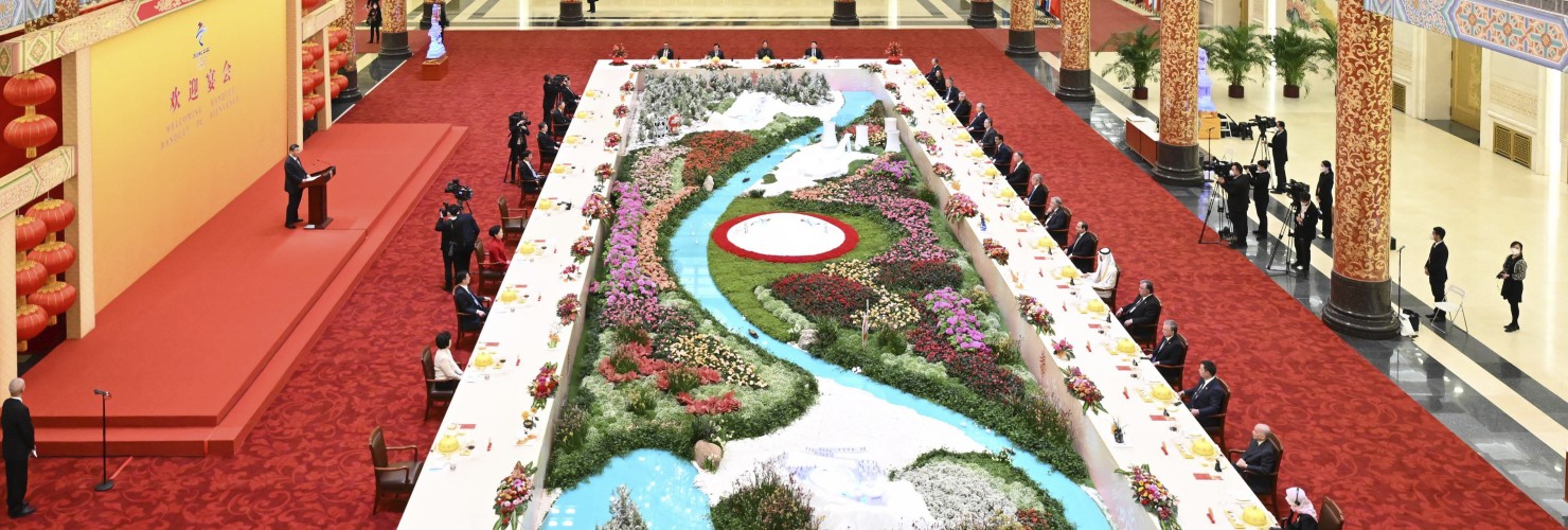 Chinese President Xi Jinping seen on podium and his wife Peng Liyuan host a banquet to welcome guests from around the world.