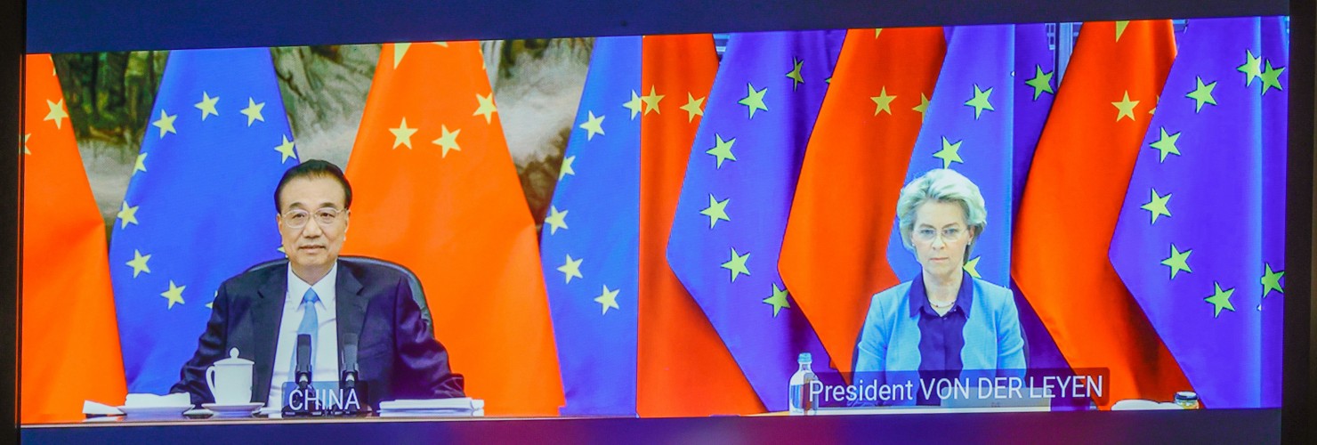 Chinese Premier Li Keqiang (L) and European Commission President Ursula von der Leyen (R) speak via video-conference with European Council President Charles Michel, and European Union foreign policy chief Josep Borrell, during an EU China summit at the European Council building in Brussels, Belgium
