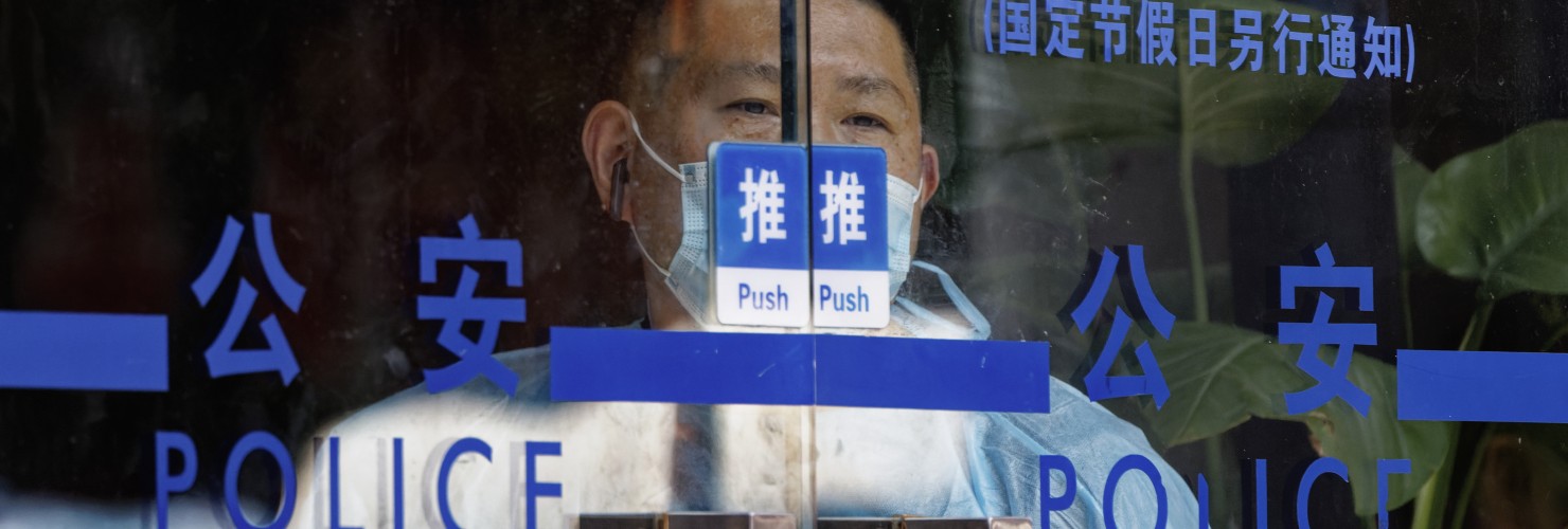 A man stands in police station, in Shanghai, China, 06 July 2022.
