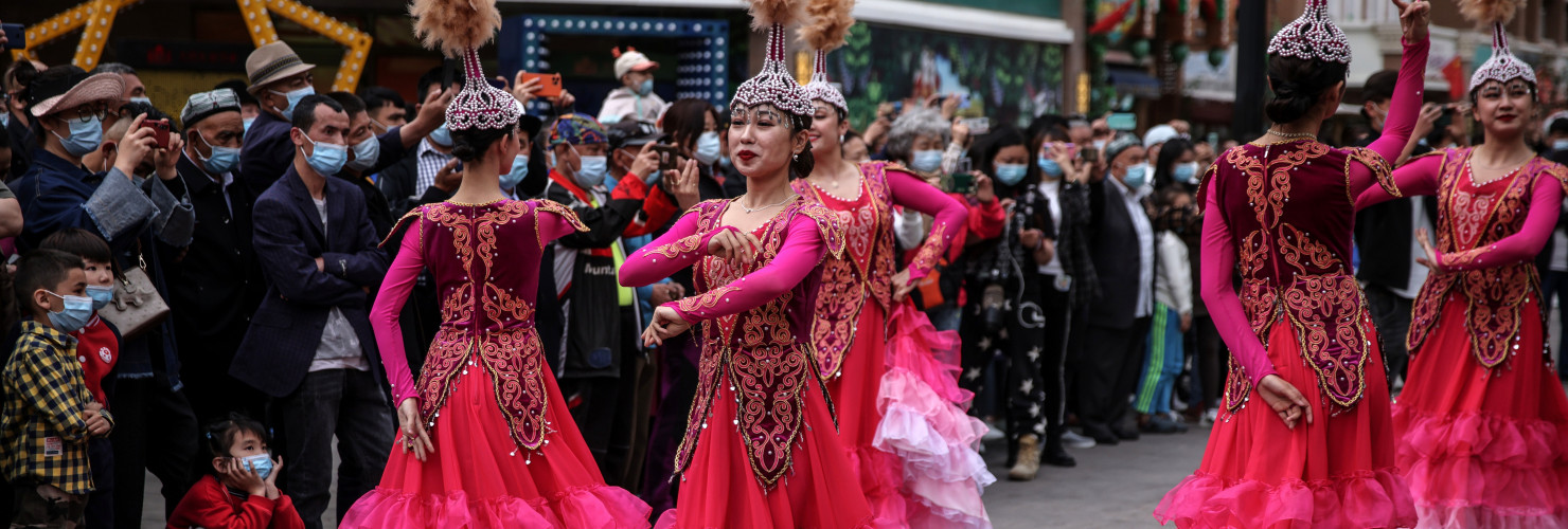 Uyghur dancers perform in Urumqi during a government organized trip for foreign journalists