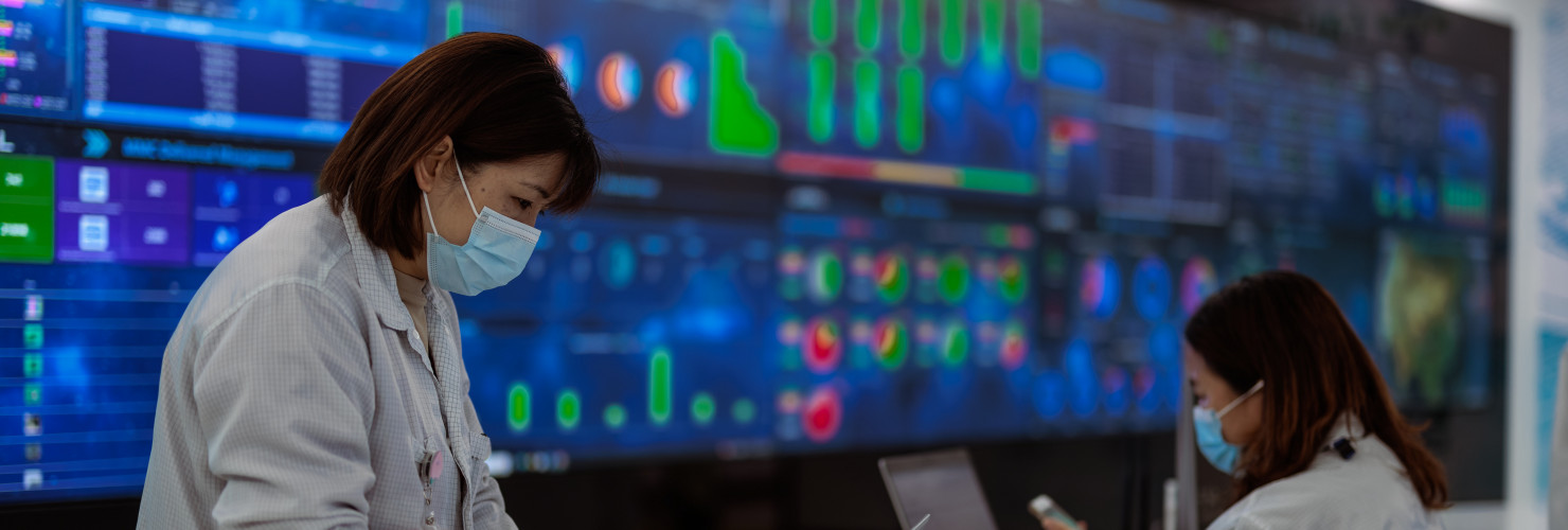 A photo taken during a press tour shows employees working at the Jabil factory producing PCBs (printed circuit boards) and other electronic components, in Wuxi, China, 21 February 2023.