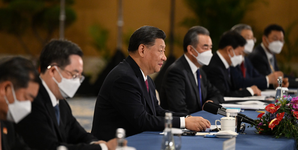 China's President Xi Jinping (C) attends a meeting on the sidelines of the G20 Leaders' Summit in Bali, Indonesia, 15 November 2022. 