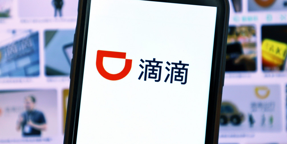 The APP DIDI interface is displayed on a mobile phone.