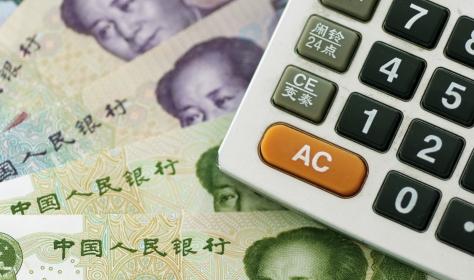 Chinese banknotes and calculator