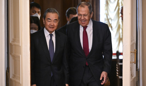 Russian Foreign Minister Sergey Lavrov, right, and the Chinese Communist Party's foreign policy chief Wang Yi enter a hall for their talks in Moscow, Russia, Wednesday, Feb. 22, 2023.