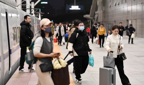  Passengers travel from Nanjing Railway Station in Nanjing, Jiangsu province, China, Feb 14, 2024.