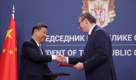 Chinese President Xi Jinping and Serbian President Aleksandar Vucic shake hands during a document signing at the Palace of Serbia during the Chinese president's two-day state visit in Belgrade, Serbia, May 8, 2024.