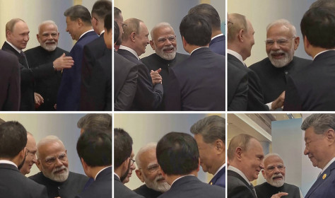 ussian President Vladimir Putin, left, Indian Prime Minister Narendra Modi, centre, and Chinese President Xi Jinping talk ahead of the Shanghai Cooperation Organization (SCO) summit