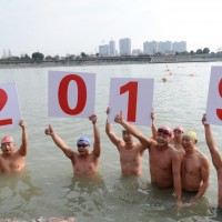Chinese winter swimmers celebrate the new year's day of 2019 in the icy water of Chaohu lake in Anhui province. 