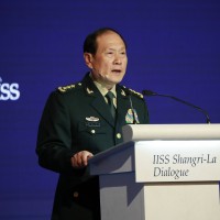 Wei Fenghe delivers his speech during the fifth plenary session of the International Institute for Strategic Studies (IISS) Shangri-la Dialogue at the Shangri-la hotel in Singapore, 12 June 2022