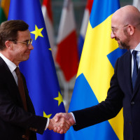 European Council President Charles Michel (R) and Prime Minister of Sweden Ulf Kristersson (L) arrive at a two-day EU Council in Brussels, Belgium, 20 October 2022. 