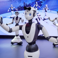 Humanoid robots perform a dance during the 2023 World Robot Conference in Beijing, China, August 18, 2023. 