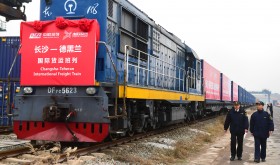 Chinese customs officers check a freight train of China Railway Express running from Changsha to Tehran. 
