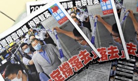 Newspapers of Hong Kong's Apple Daily are pictured at a stand in Hong Kong