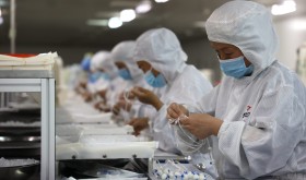 A worker rushes to produce an infusion device in a workshop of a medical device company in Pangjia Town, Boxing County, Binzhou City, East China's Shandong Province, April 12, 2022.