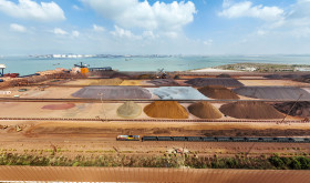 A train pulls into Dongwu port District to carry an inbound iron ore unloaded by a foreign ship in Putian, Fujian province, China, Sept 29, 2022