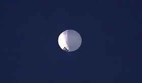 A high altitude balloon floats over Billings, Mont., on Wednesday, Feb. 1, 2023. 