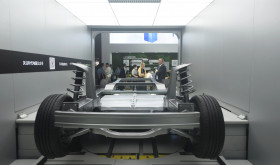 Visitors watch CATL launch its power battery automatic replacement technology at the 2023 Shanghai Auto Show in Shanghai, China.